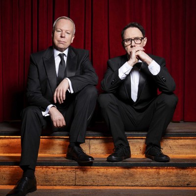 Steve Pemberton and Reece Shearsmith wearing black suits in Inside No 9 series 9 episode "Plodding On"